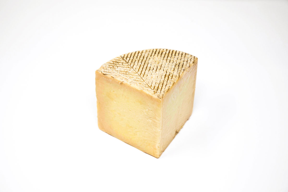 Comprar queso de oveja semi ( cuña 800 grs aprox) online de Los Norteños